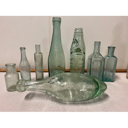 366 - Collection of antique advertising stoneware bottles and jars along with antique glass bottles to inc... 