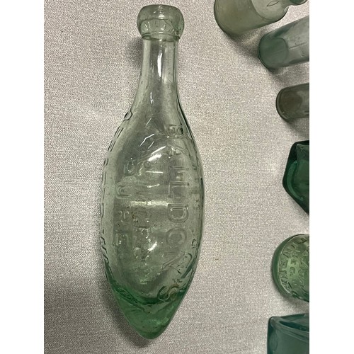 366 - Collection of antique advertising stoneware bottles and jars along with antique glass bottles to inc... 