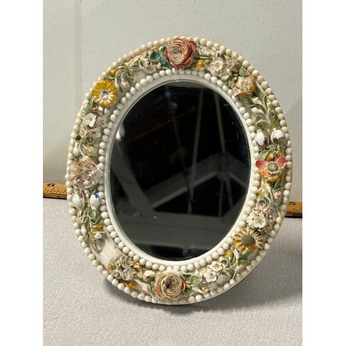 83 - Late 19th Century Royal Crown Derby (Stevenson & Hancock) oval mirror-frame
in the white, applied wi... 