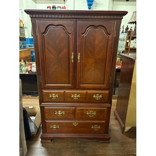 338 - Large mahogany 2 door over 4 drawer linin cabinet.