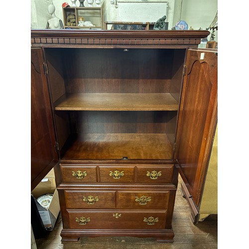 338 - Large mahogany 2 door over 4 drawer linin cabinet.