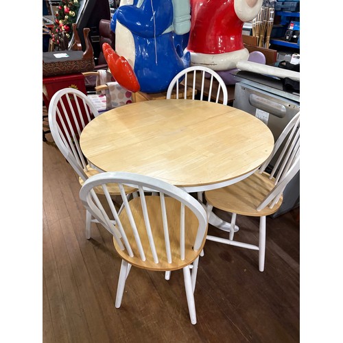 339 - Solid wood round table and 4 chairs.