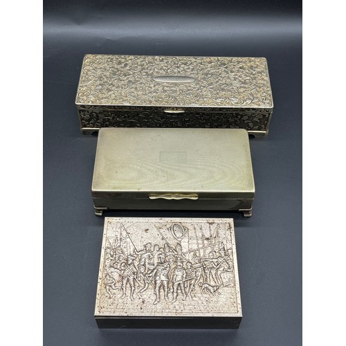 372 - 2 vintage white metal cigarette boxes along with embossed white metal jewellery box.