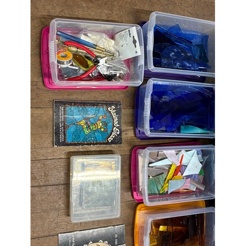 An assortment of stained glass supplies, glass and tools. Commonly used ...