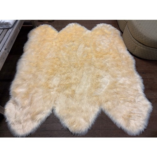 242 - Very large sheep skin rug, 2x1.8m