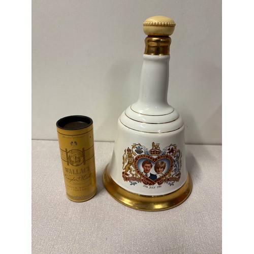 250A - A bells whisky decanter full & sealed along with whisky miniature
