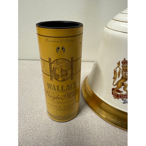 250A - A bells whisky decanter full & sealed along with whisky miniature