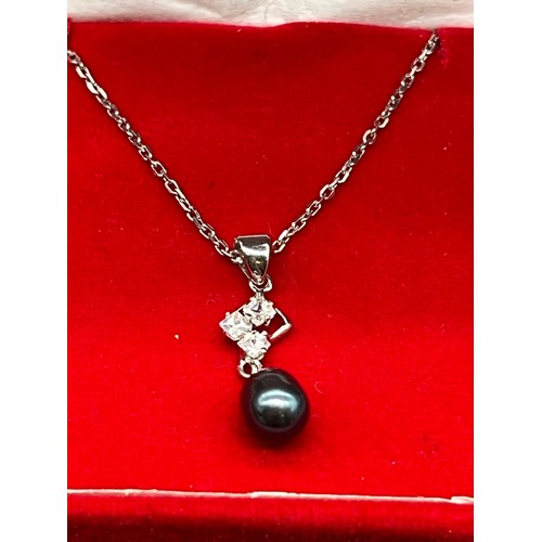 67 - 2 x silver necklaces - black pearl and 3 birds.