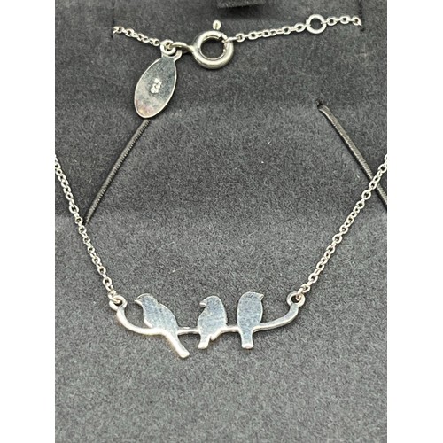 67 - 2 x silver necklaces - black pearl and 3 birds.