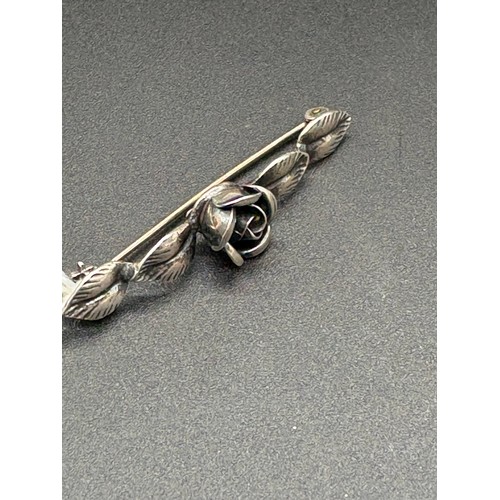 75 - A silver encased rectangular dichroic peacock style heavy glass pendant  with 18ct white g plated  c... 