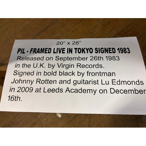94 - Pil live in Tokyo album 1983 signed by Johnny rotten and guitarist Lu Edmonds in 2009 at Leeds acade... 