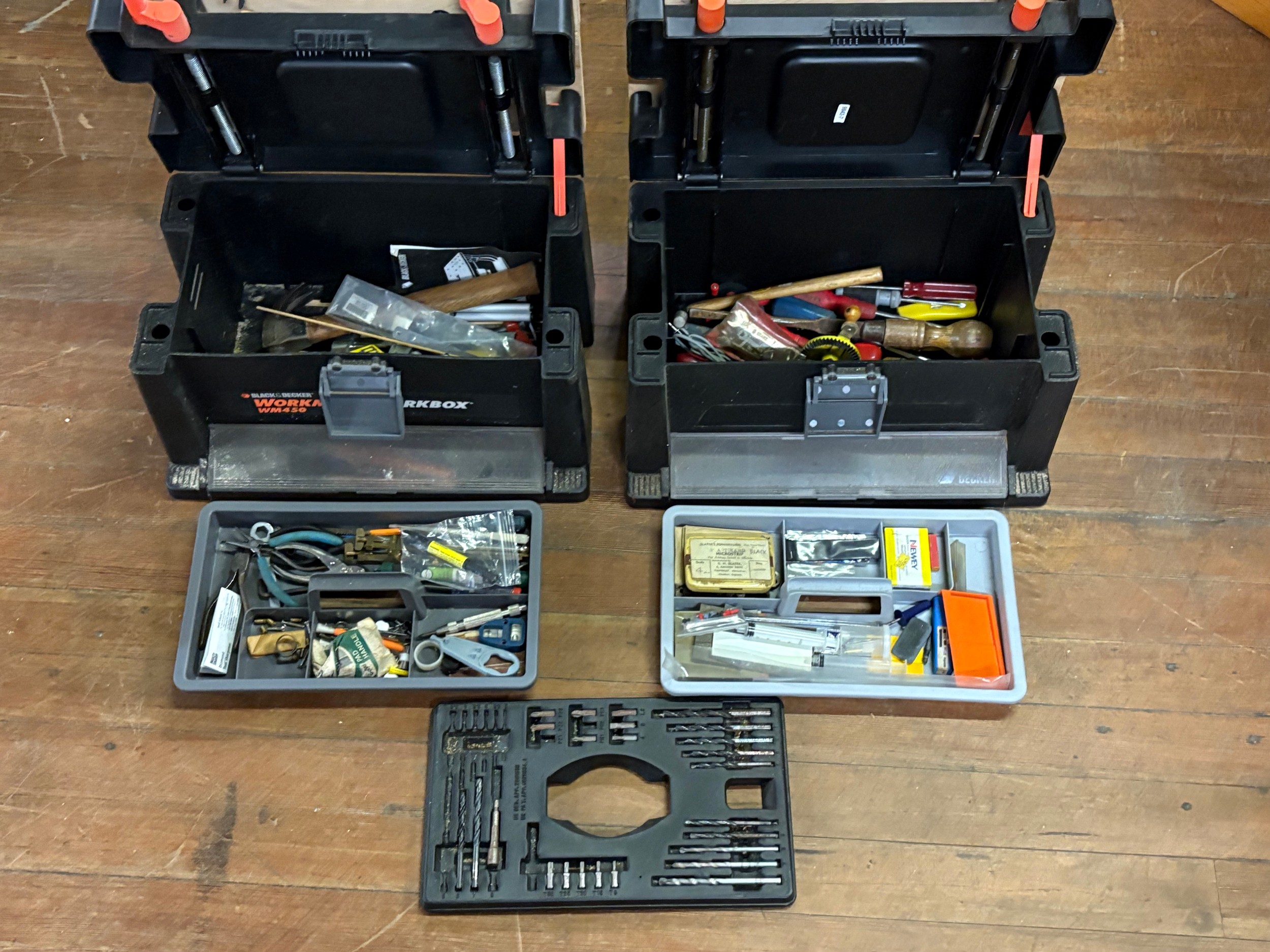 2 Black and decker work boxes to include contents.