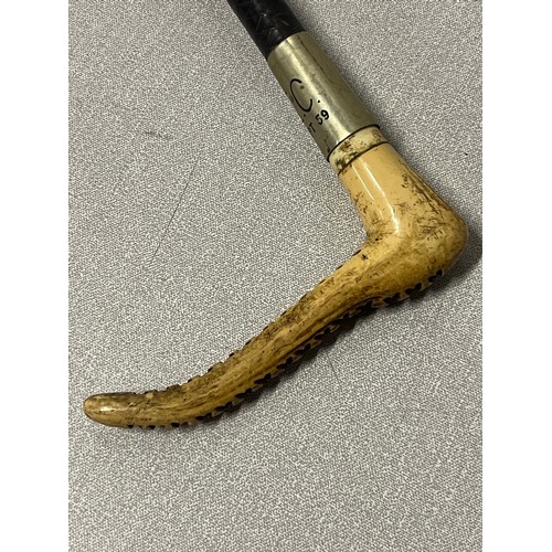 Vintage bone handled leather riding crop. Stamped 1959