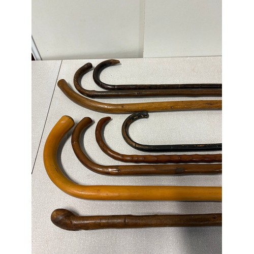 101 - Selection of 8 vintage walking sticks.