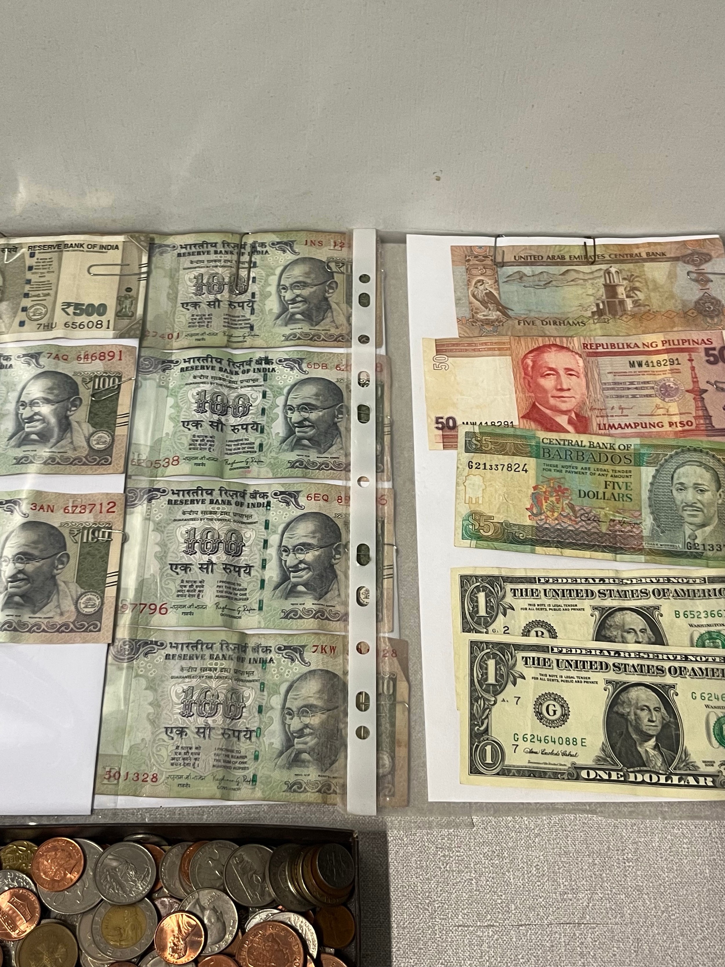 Selection of foreign bank notes & coins.
