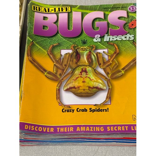 118 - A large collection of 56 real-life bugs preserved in resin block s to include spiders, scorpions , c... 