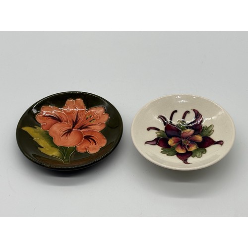121 - 2 Moorcroft dishes to include hibiscus & columbine patterns, largest is 5