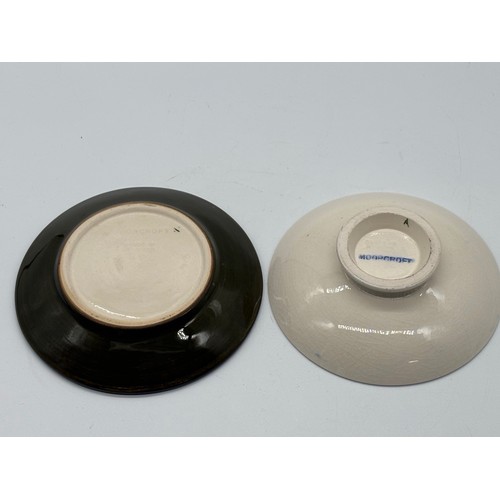 121 - 2 Moorcroft dishes to include hibiscus & columbine patterns, largest is 5