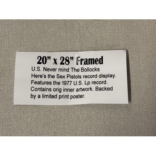 125B - Framed US Never mind the bollocks Heres the Sex Pistols record display. Features the 1977 US LP reco... 