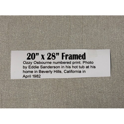 99 - Framed Ozzy Ozbourne numbered print 15. Photo by Eddie Sanderson in his hot tub at his home in Bever... 