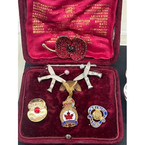 62 - Collection of military related items along with large clan and Celtic badges pins etc.