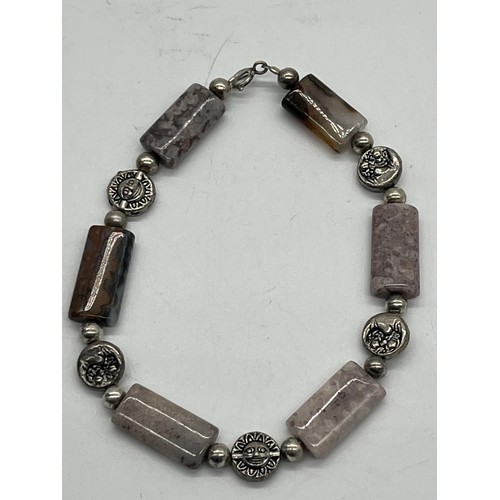 67 - Unusual tribal style necklace with onyx beads and silver toned spacers along with silver and pearl n... 
