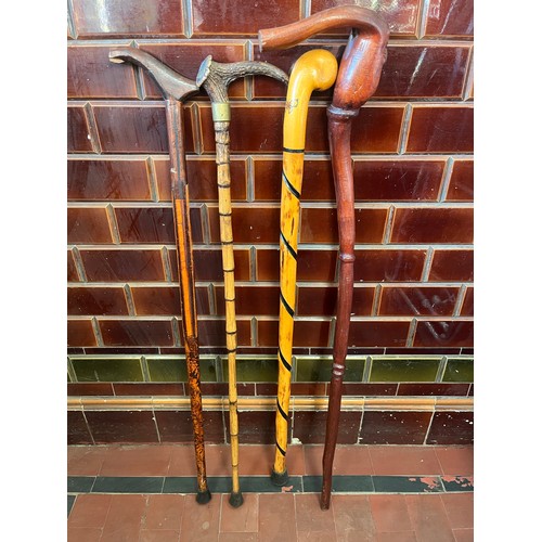 78 - 4 x vintage walking sticks to include antler and novelty face