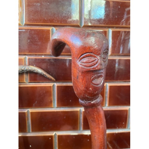 78 - 4 x vintage walking sticks to include antler and novelty face