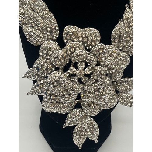 137 - Large pave rhinestone rose and leaf statement necklace along with small box of costume jewellery.