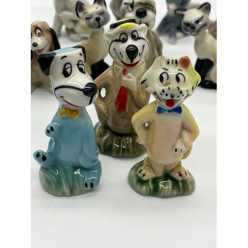 140 - Selection of wade miniatures to include Yogi bear, Huckleberry hound, Mr Jinx, Si, Am and Tramp etc ... 