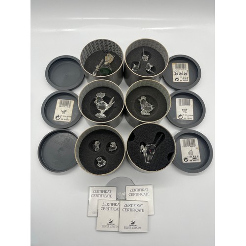 143 - 10 x boxed Swarovski crystal figures to include Miniature chicks, miniature mice and rooster etc. al... 