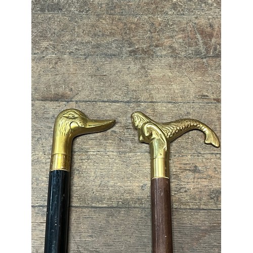 130D - 2 x vintage walking sticks one with brass duck head with hidden flask and one with brass mermaid han... 