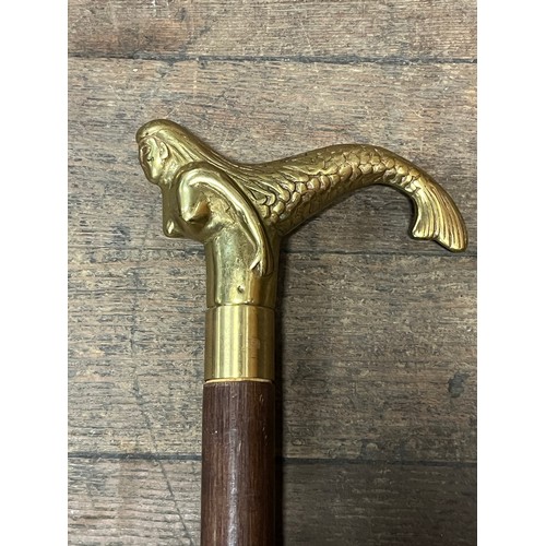 130D - 2 x vintage walking sticks one with brass duck head with hidden flask and one with brass mermaid han... 