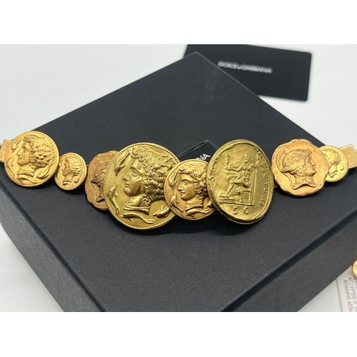 13 - Vintage Dolce & Gabbana gold tone Roman coin embellished bracelet with original box, pouch, tag and ... 