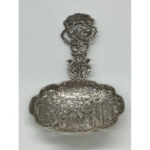 27 - Antique Dutch silver Bonbon spoon with intricate openwork, 6