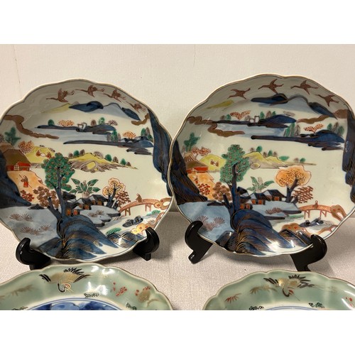 39 - 3 x Antique Arita Japanese landscape plates along with 2 x Japanese Imari plates, largest is 9