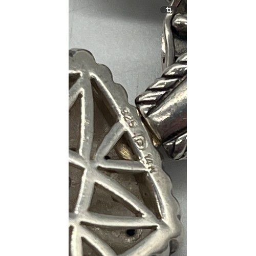 10 - Sterling silver and black diamond necklace with 14k gold accents.