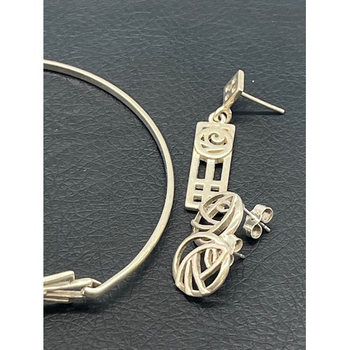 21 - Collection of sterling silver Rennie Macintosh style jewellery to include bangle, earrings and penda... 