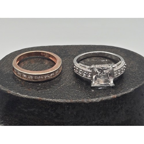 17 - 2 silver rings to include cubic zirconia.
