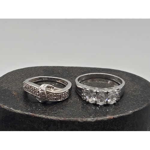 18 - 2 silver rings to include knot twist.