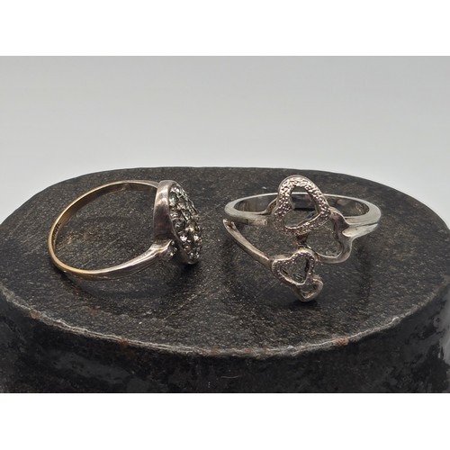 25 - Vintage 9ct & silver cluster ring along with silver graduating heart ring.