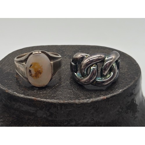 28 - 2 silver rings to include chain link style.