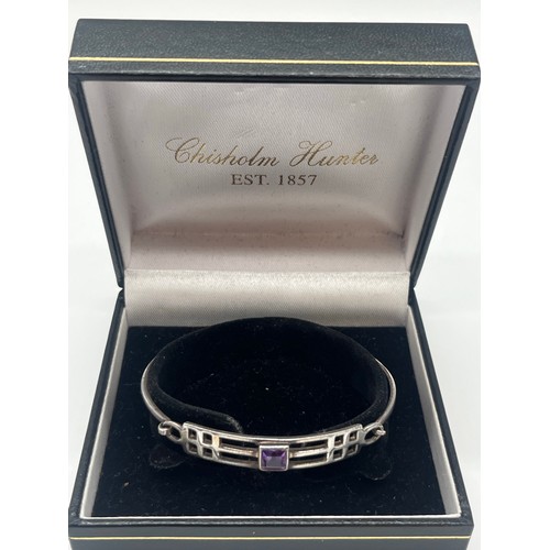 59 - sterling silver Rennie Macintosh bangle with amethyst stone