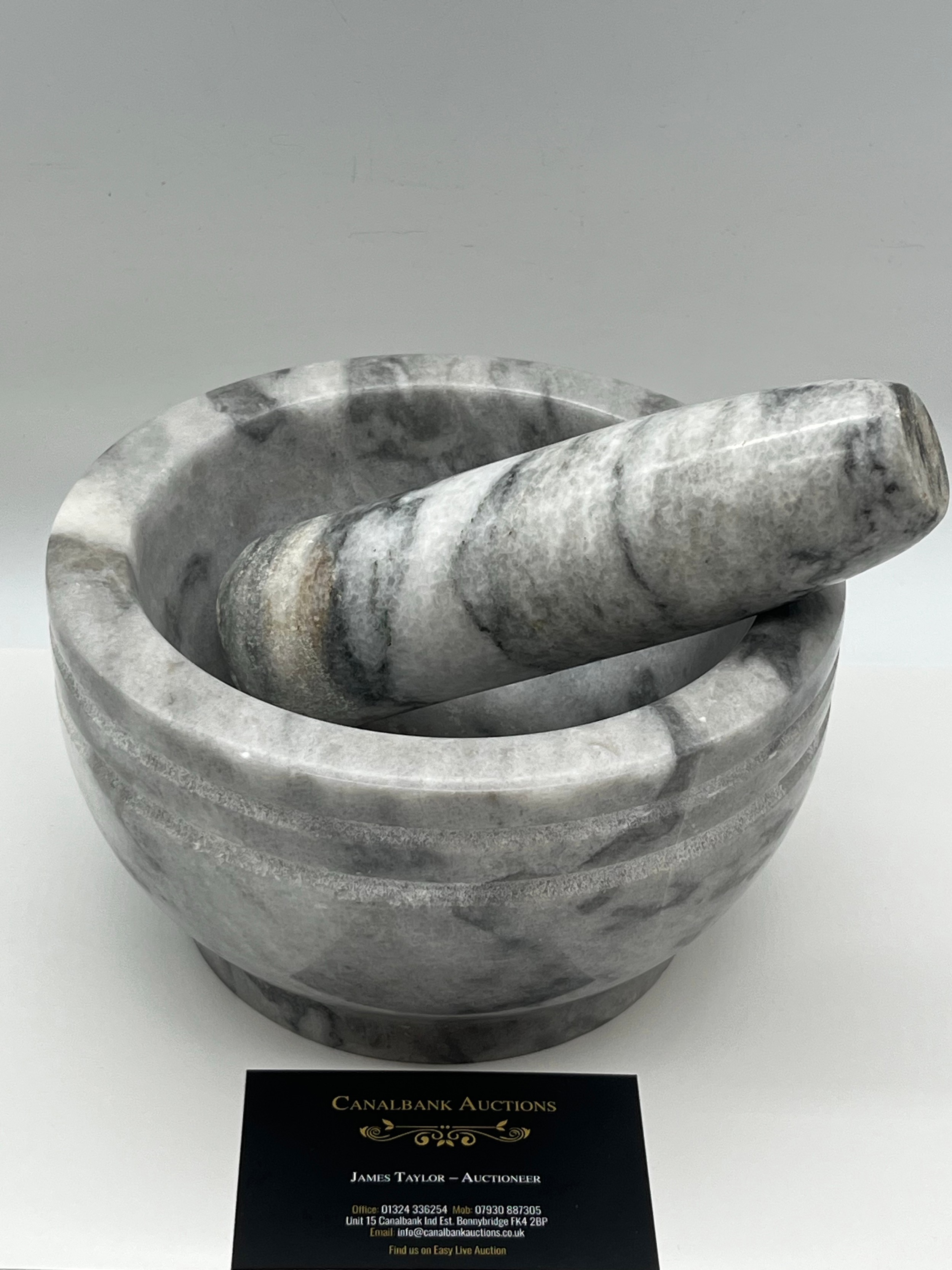 Marble mortar and pestle set.