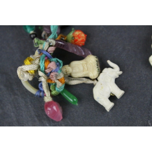 309 - Carved Bone Elephant Necklace together with Carved Bone and Stone Charms including Buddha