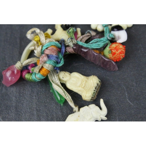 309 - Carved Bone Elephant Necklace together with Carved Bone and Stone Charms including Buddha
