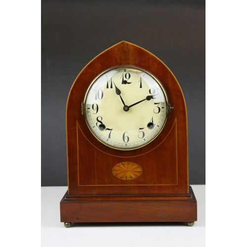 68 - Edwardian Inlaid Mahogany Arched Cased Mantle Clock, 8 day movement, the white dial with Arabic nume... 