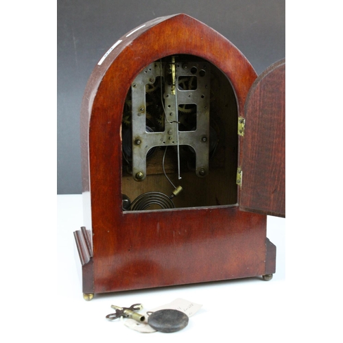 68 - Edwardian Inlaid Mahogany Arched Cased Mantle Clock, 8 day movement, the white dial with Arabic nume... 