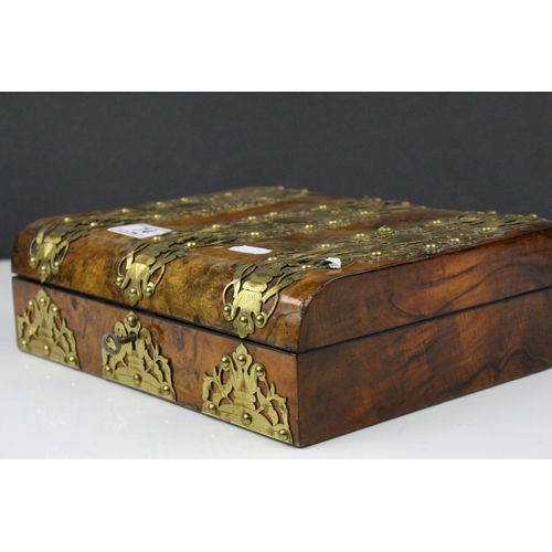 74 - Mid to Late 19th century Domed Top Walnut Writing Box with Ornate Brass Banding, the fitted interior... 