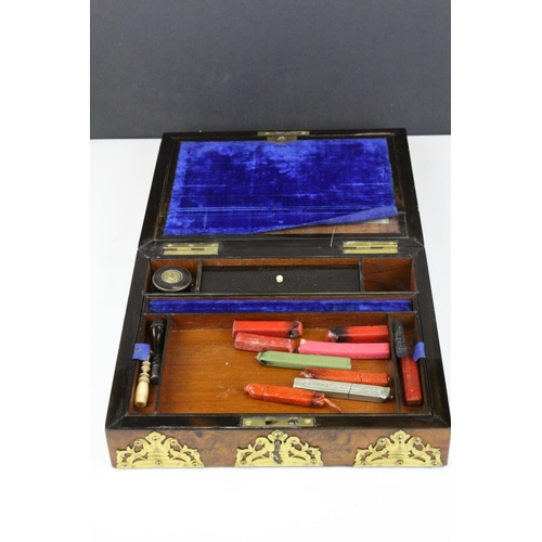 74 - Mid to Late 19th century Domed Top Walnut Writing Box with Ornate Brass Banding, the fitted interior... 